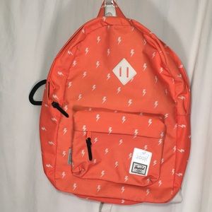 Herschel backpack bright orange reflective details